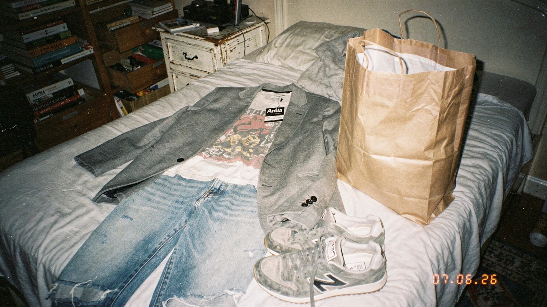 Shopper studying a virtual try-on preview of a blazer on their photo before adding to cart on Shopify