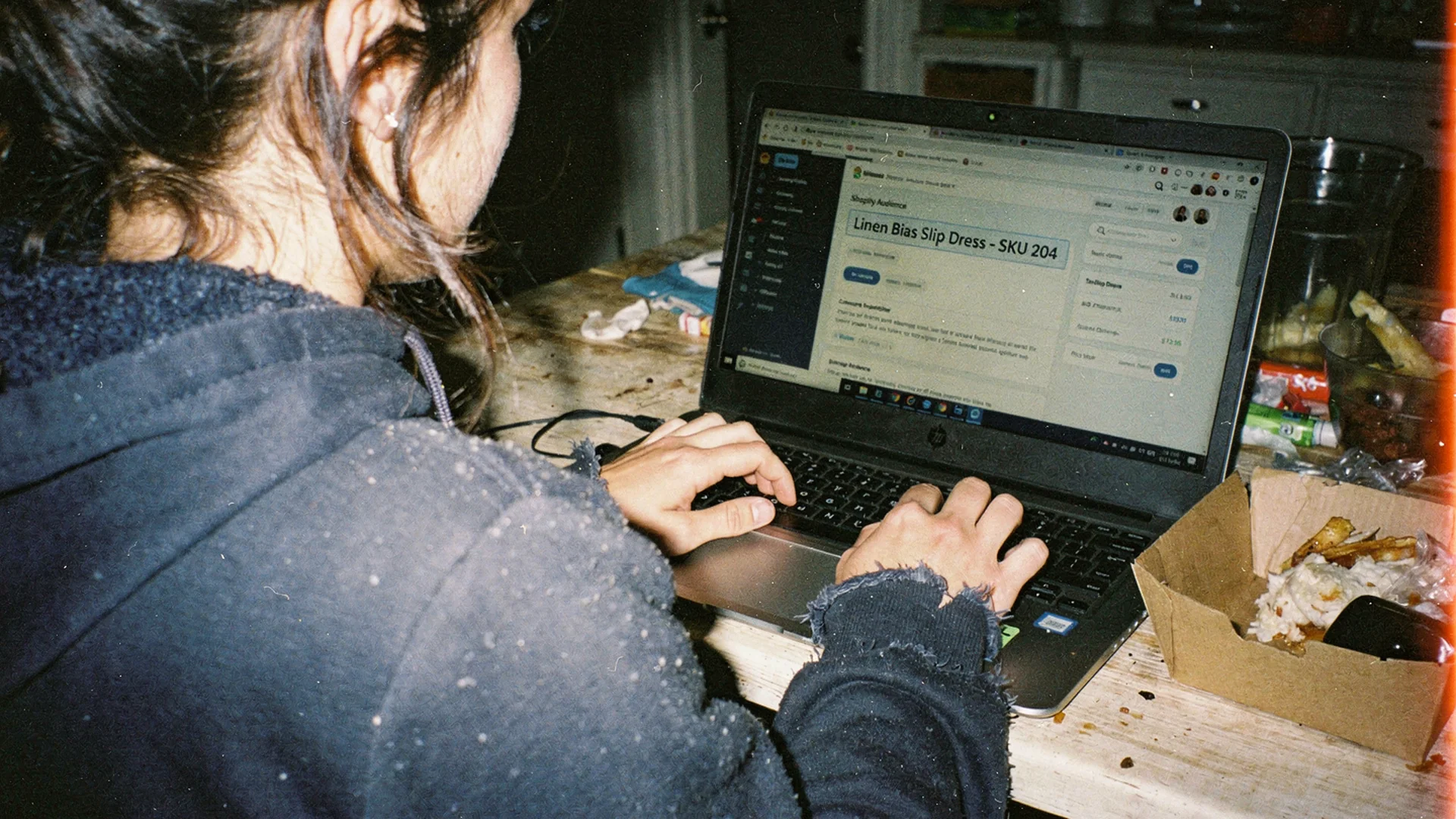 Fashion performance marketer reviewing a virtual try-on remarketing campaign for a specific Shopify garment